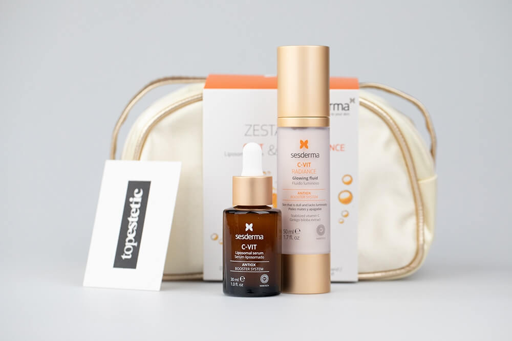 Sesderma C - Vit Set ZESTAW Serum liposomowe 30 ml + Krem rozświetlający 50 ml + Kosmetyczka Złota 1 szt