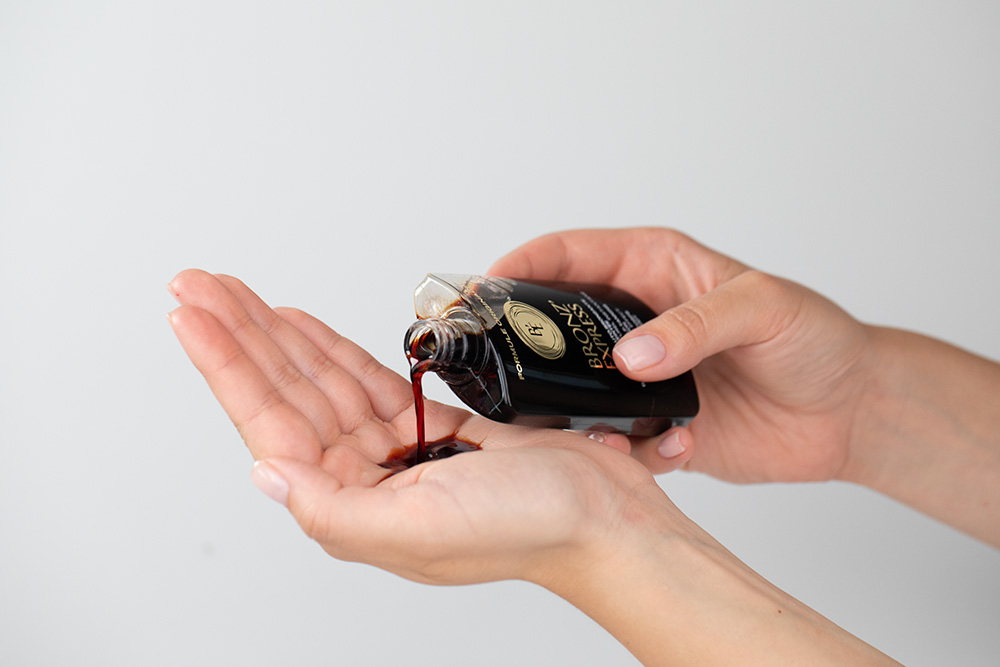 Academie Sunshine Skin ZESTAW Peelingujący żel pod prysznic 200 ml + Samoopalacz w płynie na twarz i ciało 100 ml