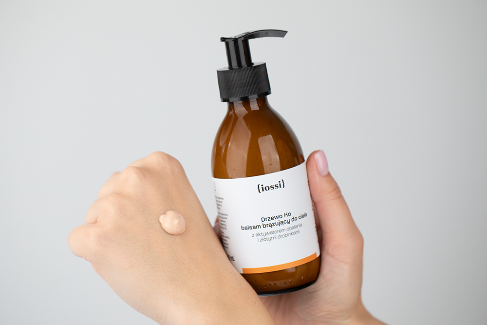 Iossi Drzewo Ho Balsam brązujący z aktywatorem opalania i złotymi drobinkami 190 ml