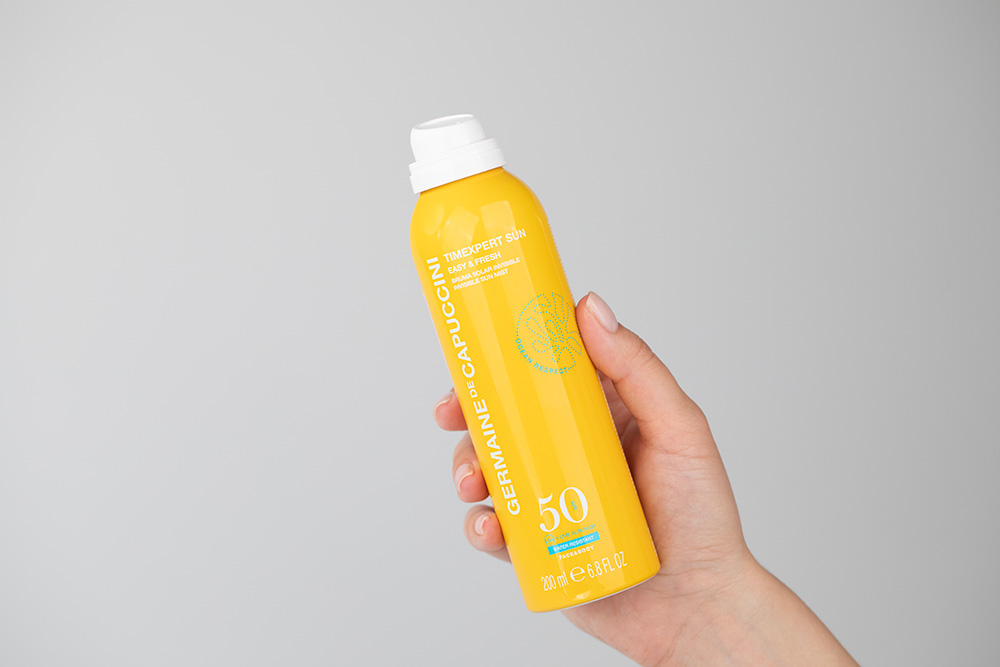 Germaine de Capuccini Timexpert Live the Sun Body Set ZESTAW Niewidoczna mgiełka słoneczna SPF 50 200 ml + Regenerujący zabieg na ciało po opalaniu 200 ml + kosmetyczka 1 szt