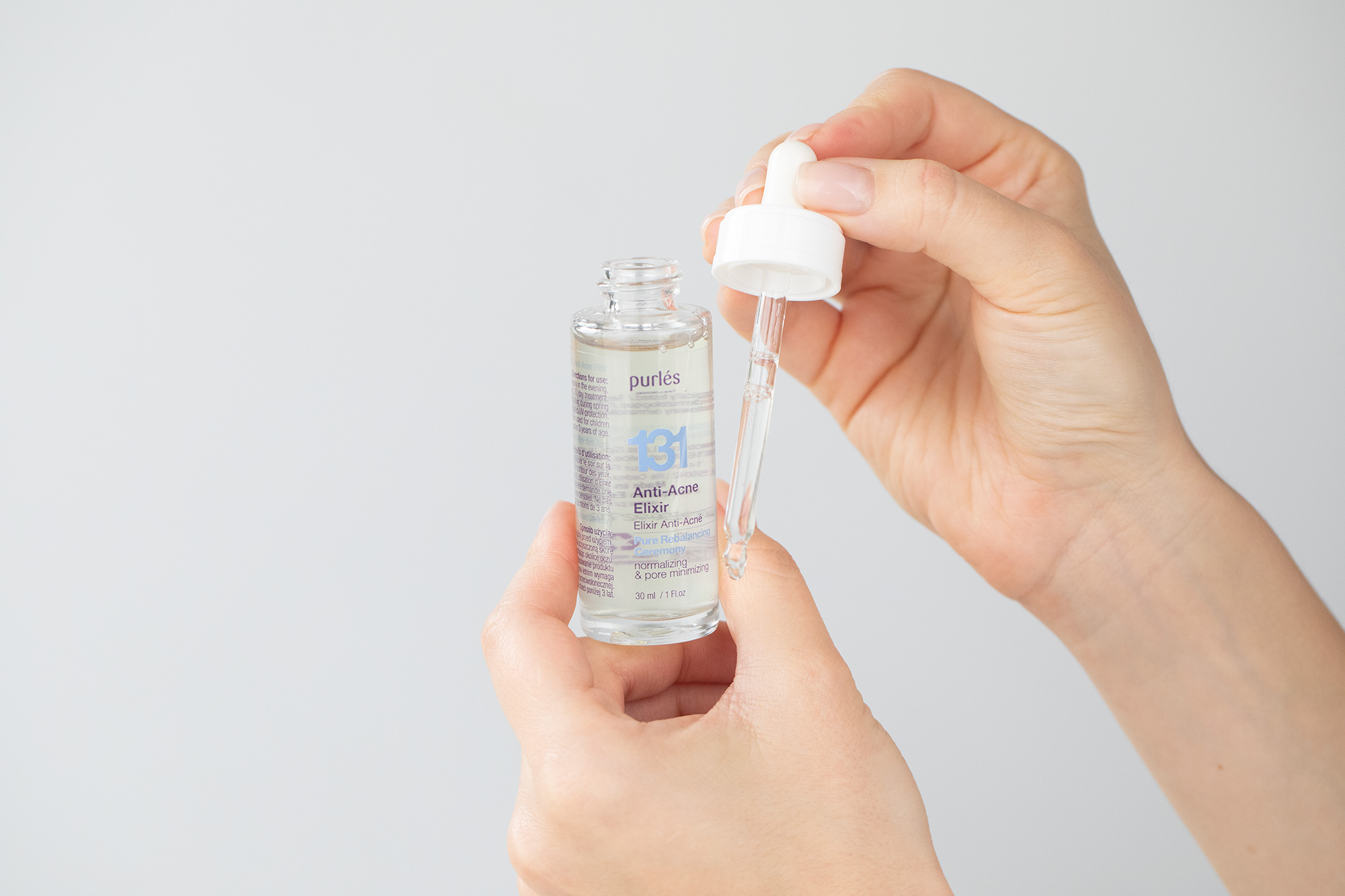 Purles Anti-Acne Set ZESTAW Pianka myjąca 125 ml + Elixir przeciwtrądzikowy 30 ml + Krem balansujący 50 ml + Kosmetyczka 1 szt