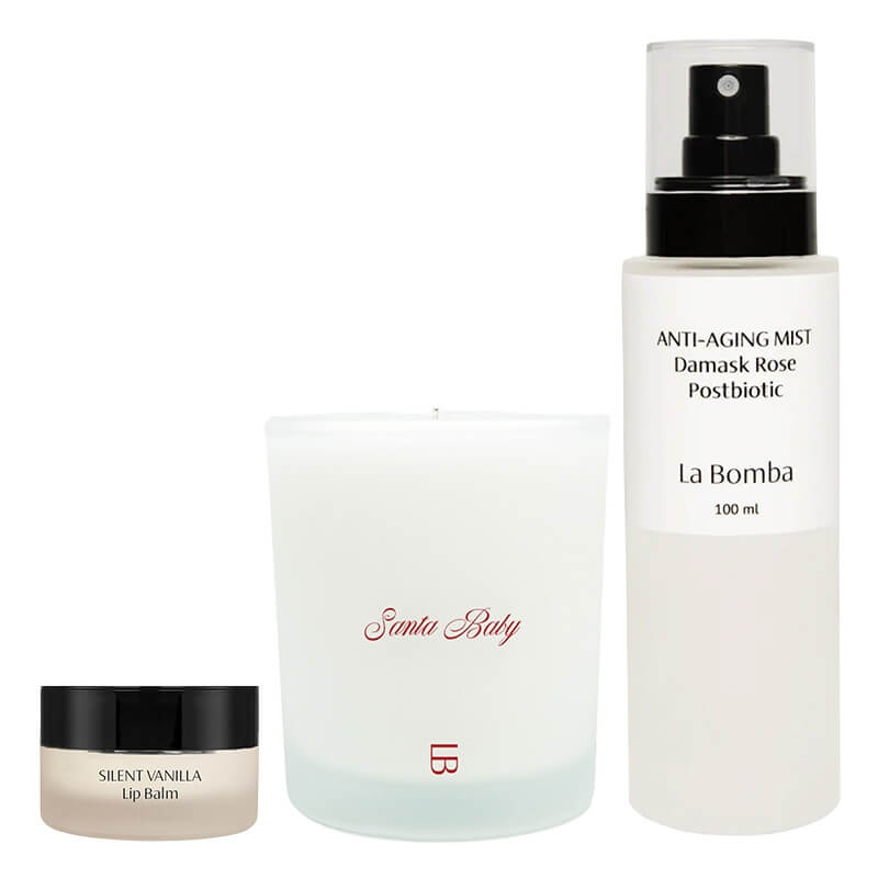La Bomba Silent Vanilla + Damask Rose + Santa Baby ZESTAW Odżywczy balsam do ust 15 g + Mgiełka nawilżająco-wygładzająca 100 ml + Świeca 150 g